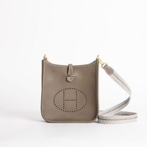 wsxc1747148194403_0-1-scaled-1 Canada Toronto Hermes Mini Evelyne 18CM Clemence CC18 Etoupe / White Strap Gold Hardware