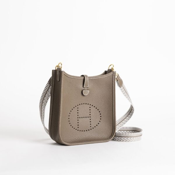 wsxc1747148194403_1-scaled-1 Canada Toronto Hermes Mini Evelyne 18CM Clemence CC18 Etoupe / White Strap Gold Hardware