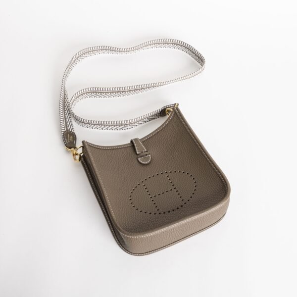 wsxc1747148194403_2-scaled-1 Canada Toronto Hermes Mini Evelyne 18CM Clemence CC18 Etoupe / White Strap Gold Hardware